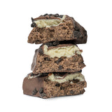 A stack of Mountain Joe's Chocolate Cookie Cream Protein Bars